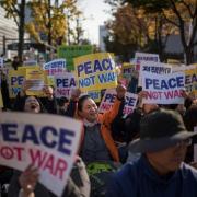 Thousands urge peace in anti-Trump protest in S. Korea